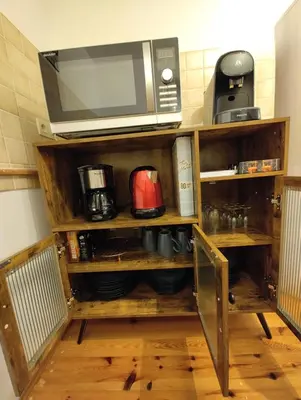 Cuisine ou kitchenette dans l'établissement Cosy Triplex 3 chambres