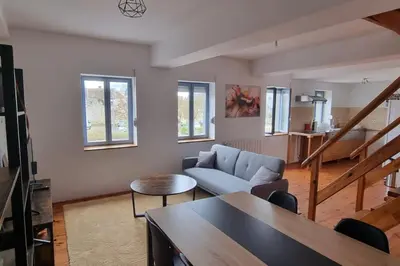 Coin salon dans l'établissement Cosy Triplex 3 chambres