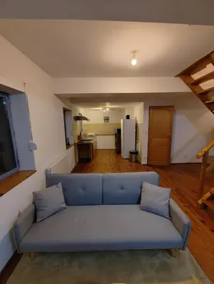 Coin salon dans l'établissement Cosy Triplex 3 chambres