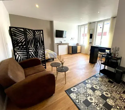 Coin salon dans l'établissement Brown Cosy Loft Centre